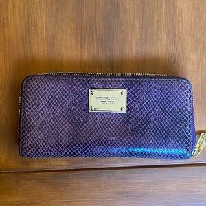 Michael Kores Jet Set Purple snakeskin textured wallet